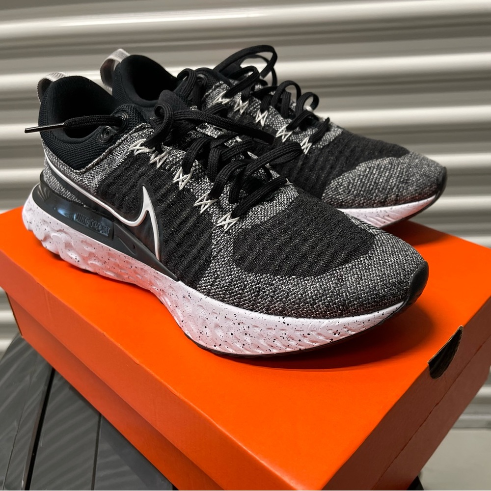 Grey black and white Nike react infinity run sneakers